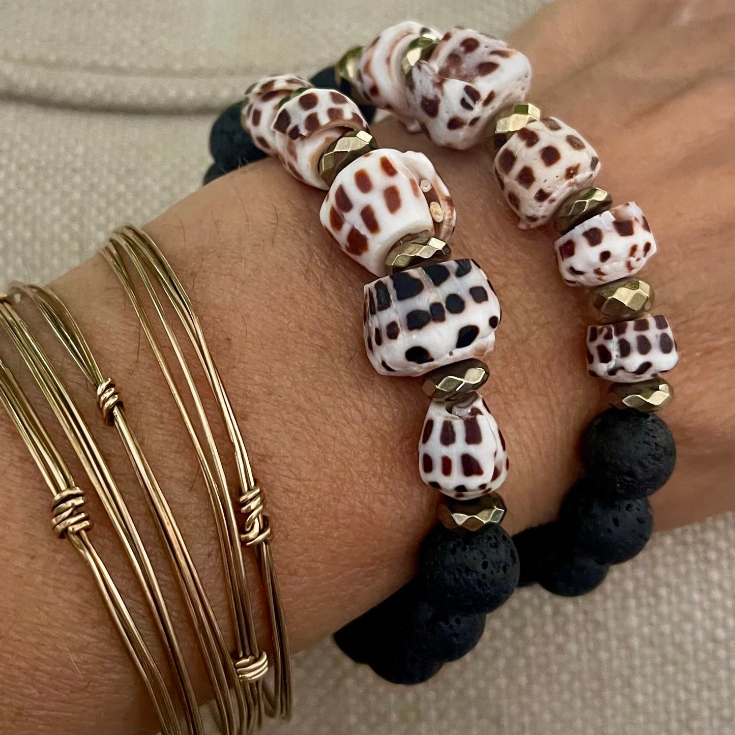 Cone Shell Puka and African glass Cuff