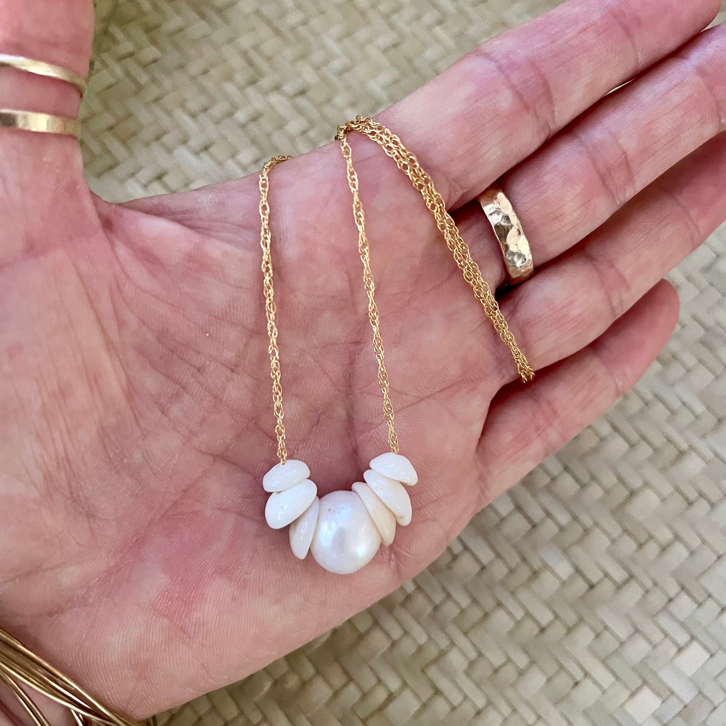 Puka and pearl necklace