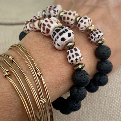 Cone Shell Puka and African glass Cuff