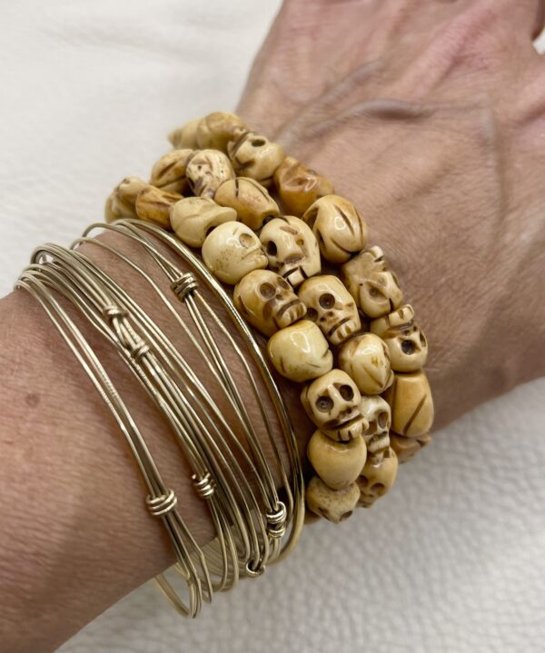 skulls bracelets on a wrist